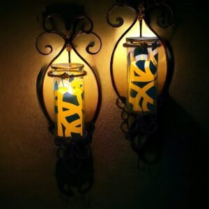 Elegant St Tropez Black Metal Sconces with Geometric Etched Glass (Front View)